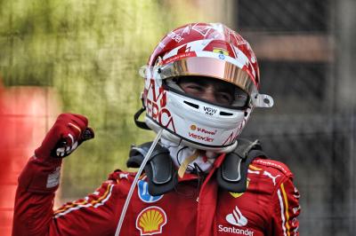 Charles Leclerc celebrates his first win at home